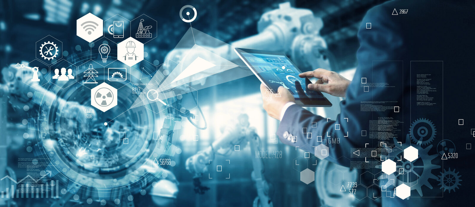 Industrial engineer monitoring robotics systems