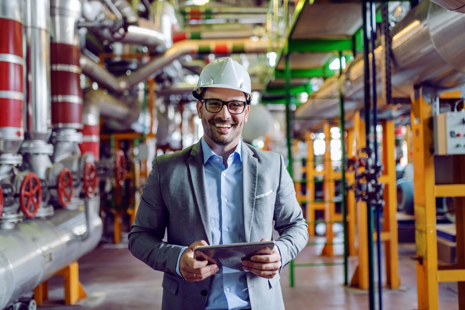 Engineering manager and mechanic on a factory floor